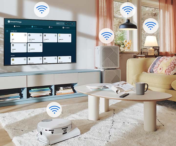 The SmartThings UI is on display on the TV. Wi-Fi icons are floating on top of the TV, vacuum robot, air purifie and lights.