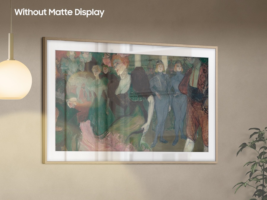 The Frame TV displays an artwork but Without Matte Display reflections from a nearby lamp make it hard to see clearly.