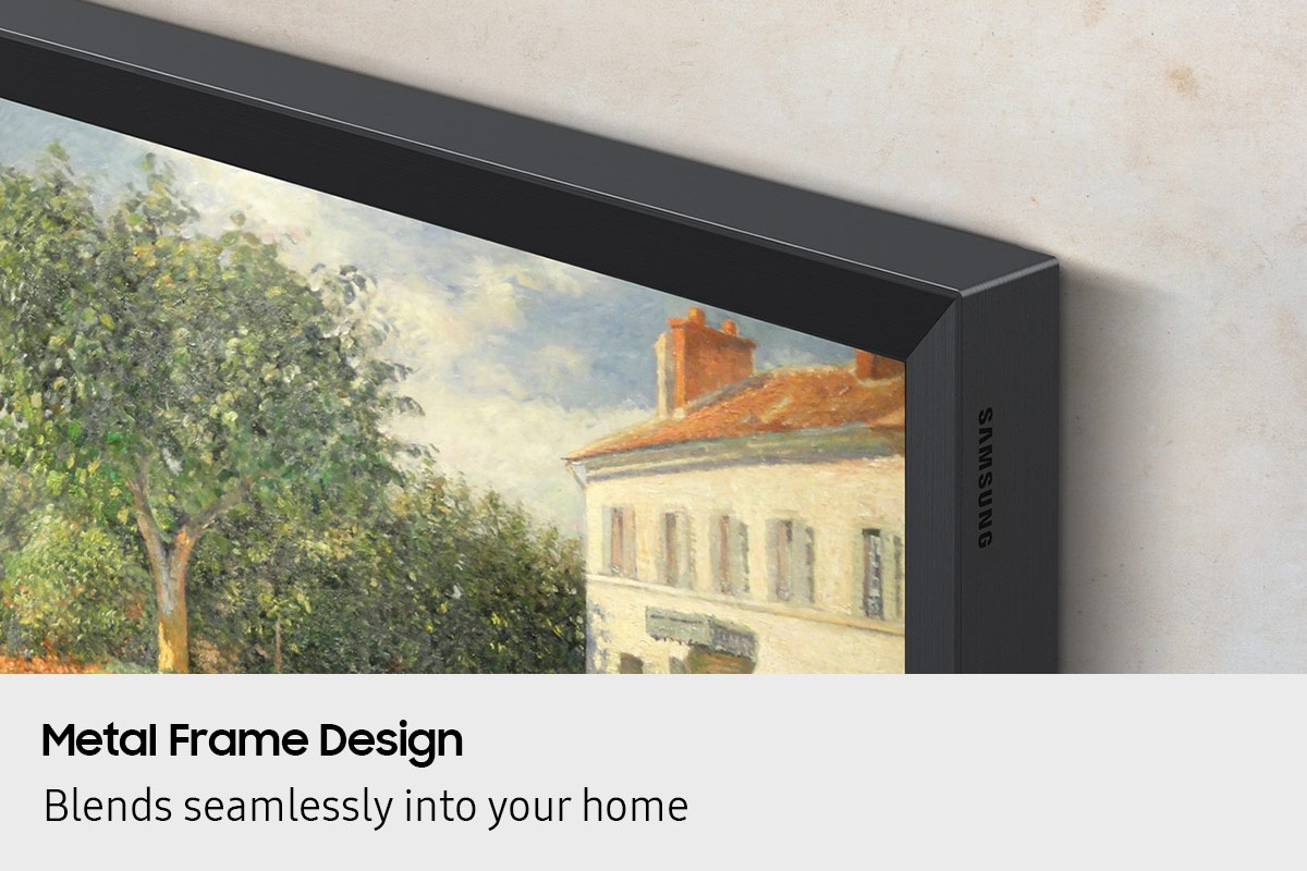 A close-up on a corner of a TV with the metal frame design, which makes it look like a picture frame as it displays artwork.