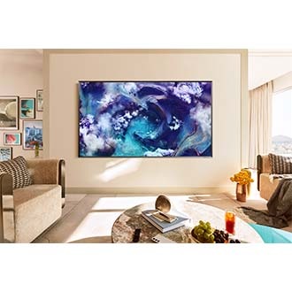 A Neo QLED TV is installed on the wall of a living room. It displays a vivid blue waves on screen.