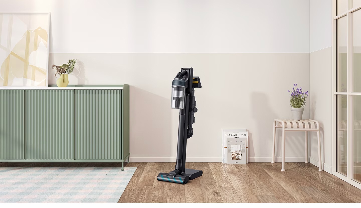 Jet 85 is standing in charging station on the wall of a modern living room. Actual model may vary depending on specification.