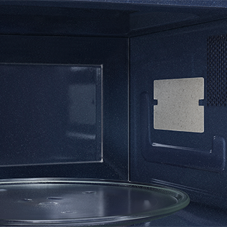 Komora mikrofalówki MS23A7013GB/EO pokryta jest gładką emaliowaną powłoką ceramiczną w kolorze ciemnoniebieskim