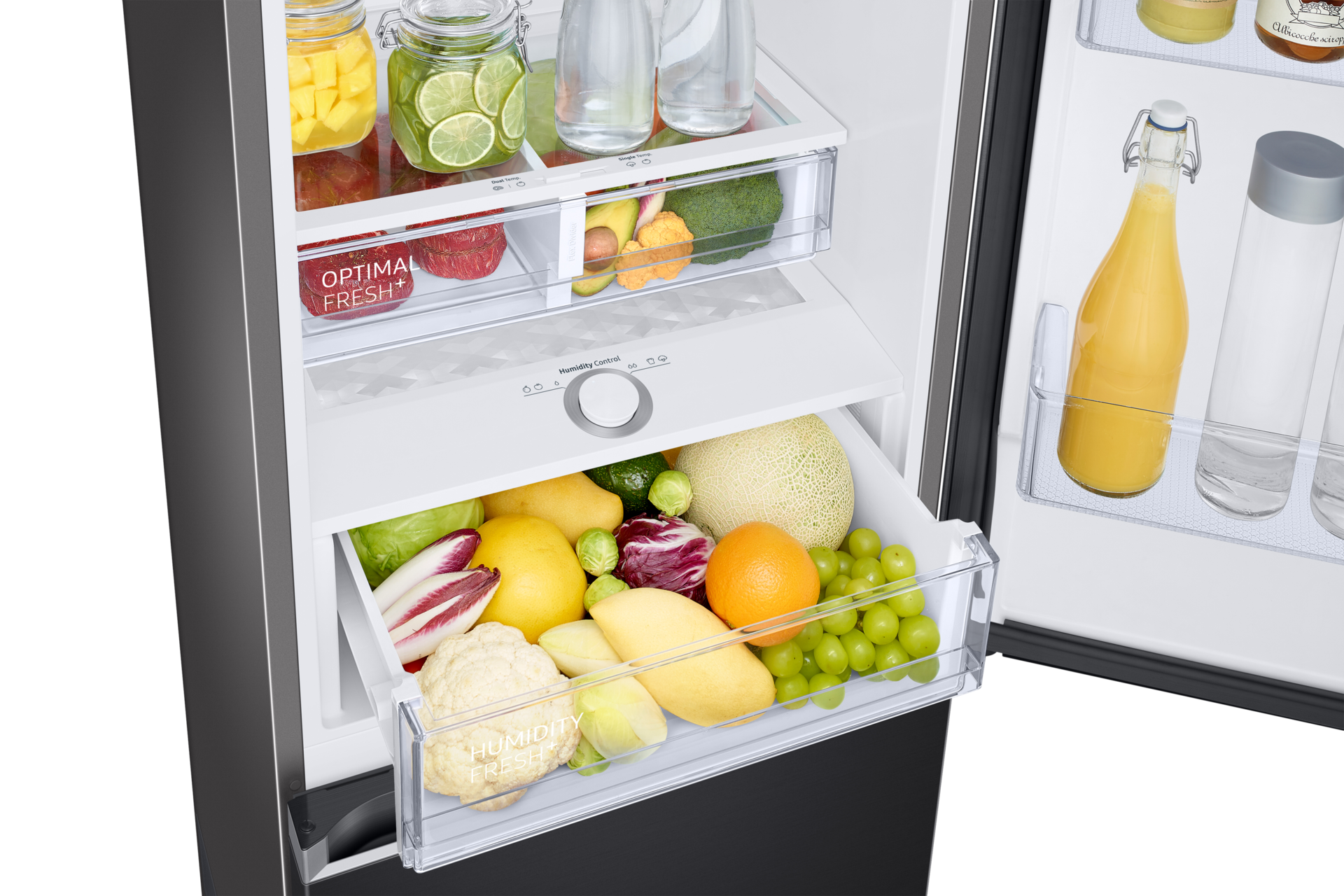 Wnętrze lodówki RB34C603CB1/EF z dolnym zamrażalnikiem, widok na szuflady Humidity Fresh, Optimal Fresh wypełnione produktami spożywczymi, szuglada dolna jest wysunięta