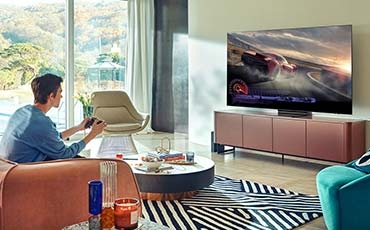 A couple is watching TV.