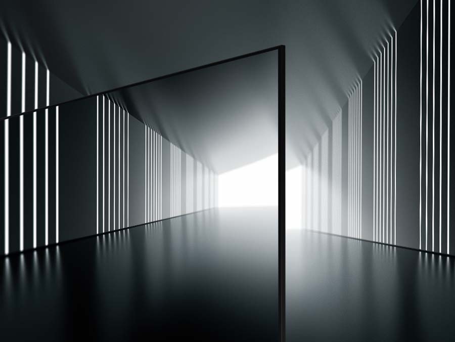 Безрамочный дизайн Crystal UHD TV демонстрируется в центре, который кажется длинным туннелем.