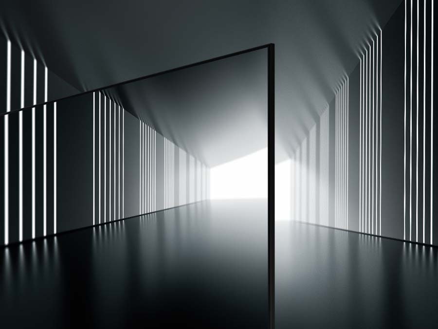 A bezelless design of the Crystal UHD TV is on display at the center of what seems like a long tunnel.