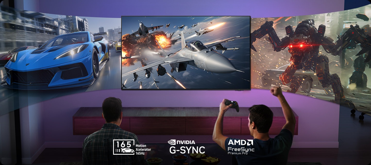 Two men gaming in the living room. 3 large screens display different games 165 Motion Xcelerator 165Hz, Nvidia G-Sync and AMD FreeSync Premium Pro logos.