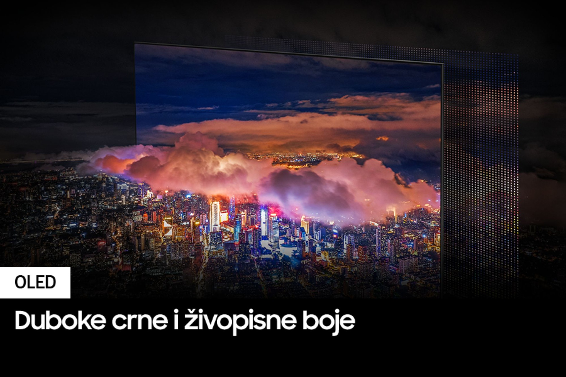 Prikazan je grad obasjan jakim svetlima. Boje i svetla su živopisni kao što OLED svetla prikazuje kroz QD ekran.