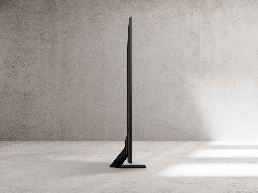 Боковой профиль NeoSlim QN90D подчеркивается тонким лучом, проходящим по краю телевизора сверху вниз.