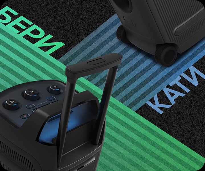 Крупный план ручки Sound Tower ST50F с надписью GRIP и встроенных колес с надписью ROLL.