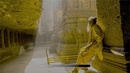 An old man leans against a stone pillar. A dark and light contrast bar graphic illustrates improved color contrast performance.