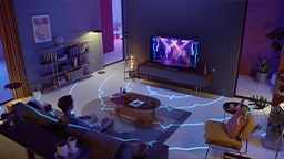 Space-Fit sound waves are spreading out through living room from TV, detecting space to provide optimized sound.