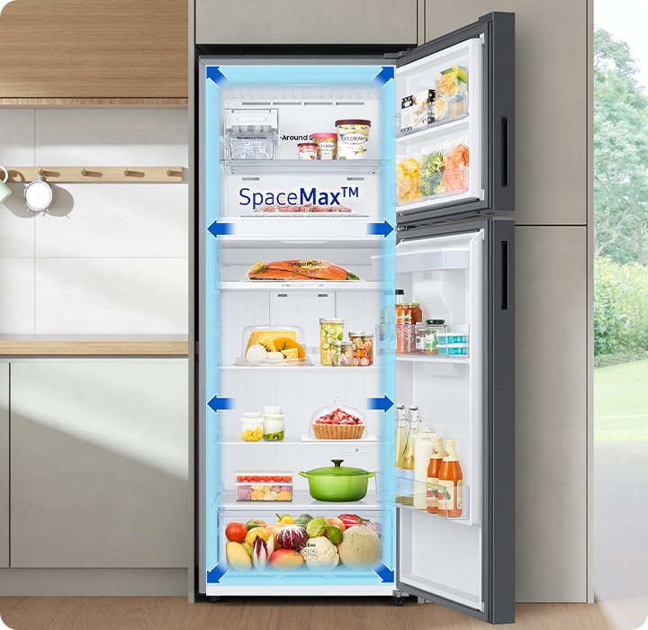 RT6300C refrigerator door open. SpaceMax™ technology is indicated from inside to outside of the product with an arrow.