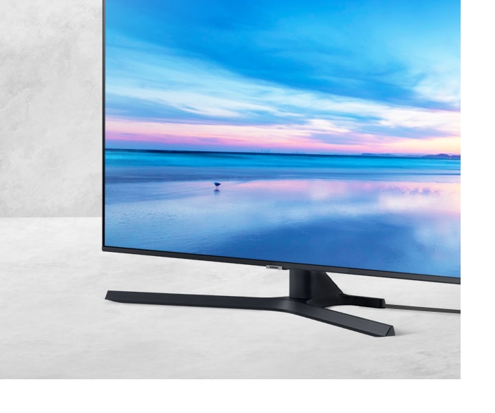 A Close-Up View Of Au7000 On Stand Shows Less Viewing Distraction From Cables Due To Its Clean Cable Solution