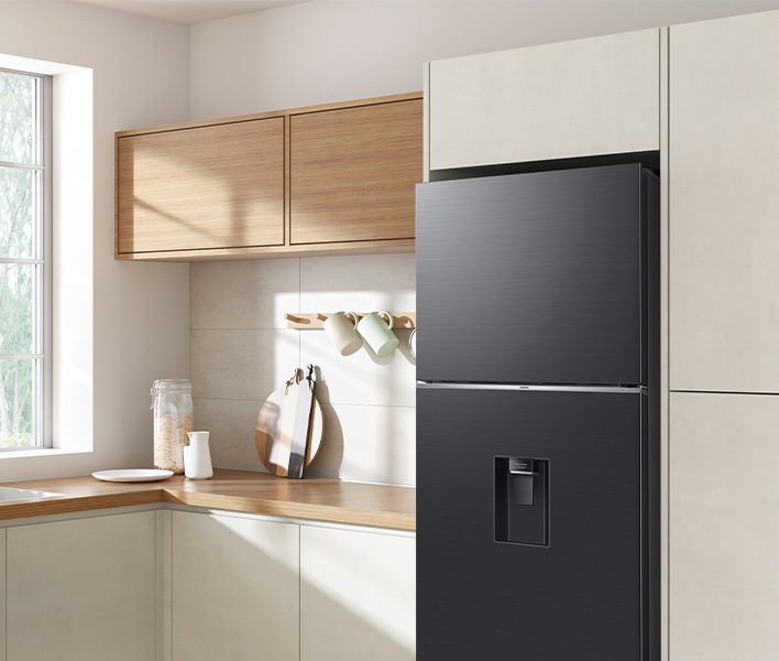 The sleek exterior of the fridge gives a clean look to the modern kitchen, with a flat finish.