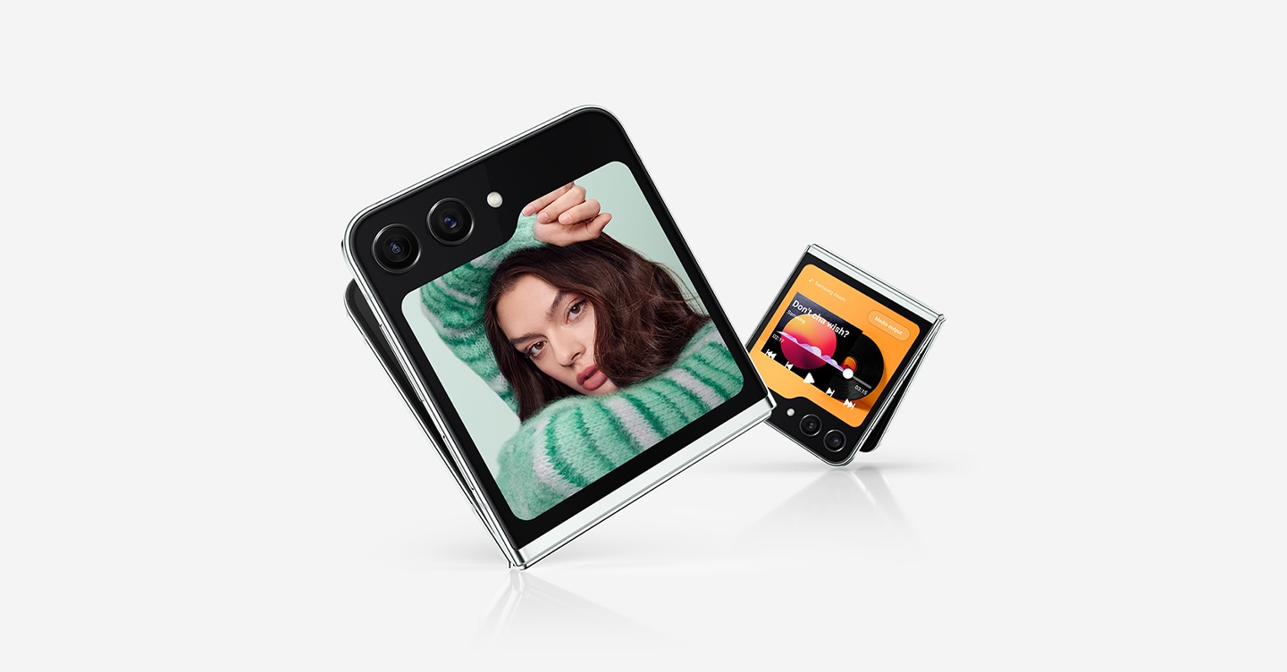 Two Galaxy Z Flip5 devices are slightly unfolded and seen from the Flex Window. One shows a selfie. The second shows a media player with playback controls and a progress bar.