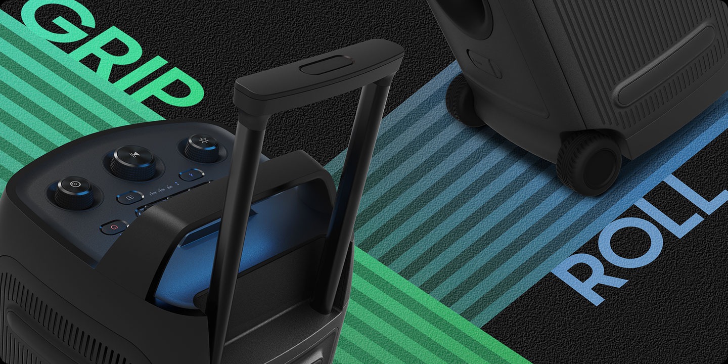 Close-up of the Sound Tower ST50F's handle with the word GRIP, and built-in wheels with the word ROLL.