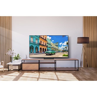 OLED is displayed on the table in a living room.