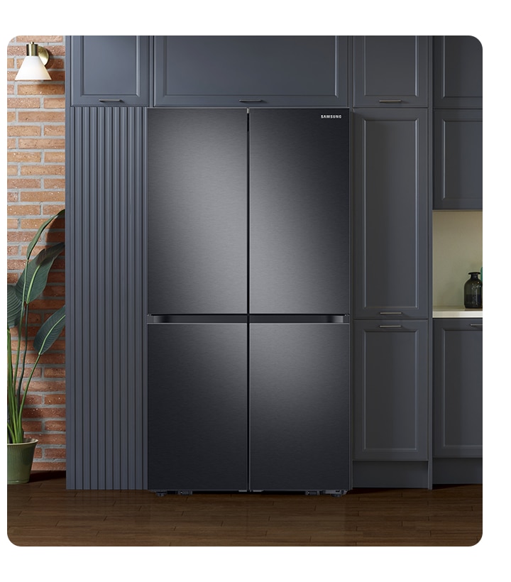 The sleek exterior of the fridge gives a clean look to the modern kitchen, with a flat finish and no recessed handles.