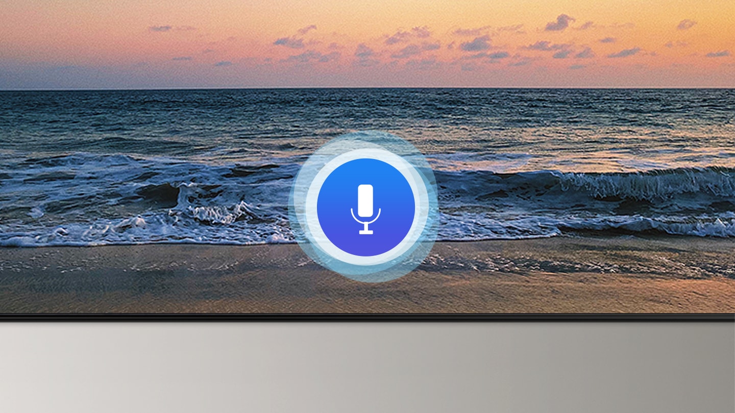 A microphone icon overlays a beach sunset TV screen image, demonstrating QLED TV voice assistant feature.