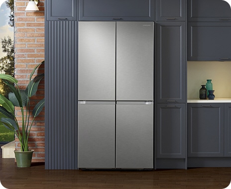 The sleek exterior of the fridge gives a clean look to the modern kitchen, with a flat finish and no recessed handles.