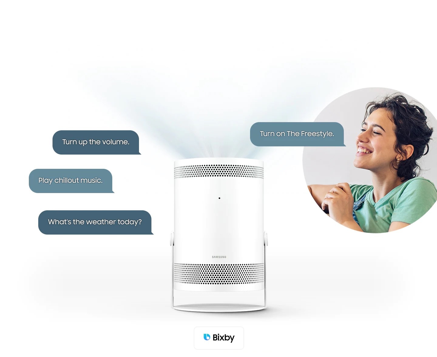 A woman is talking to The Freestyle saying "Turn on The Freestyle", "Turn up the volume", "Play chillout music", and "What's the weather today?" The †Bixby' and †Alexa built-in' logos are displayed on the bottom.