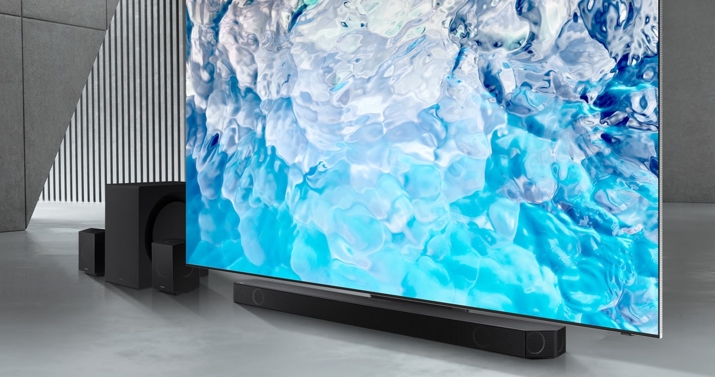 Samsung Q series Soundbar, subwoofer and rear speakers are positioned with QLED TV.