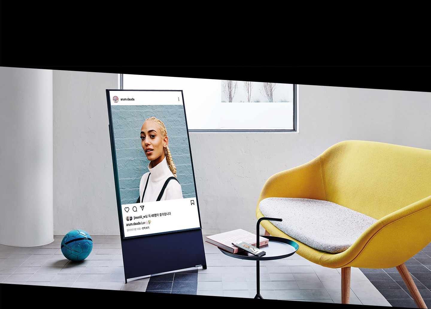 The Sero is displaying an Instagram image on its screen in vertical mode.