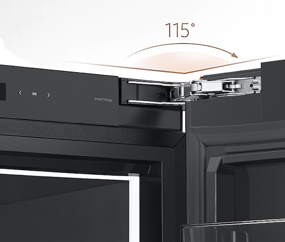 A door with a built-in hinge opens out to 115°.