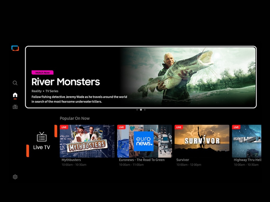 TV in a living room shows Samsung TV Plus home screen and the diverse TV channels available with it.