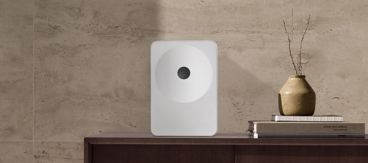 Music Studio 7 speaker featuring The Dot at its center, a focal point where sound flows, uniting refined design and advanced technology.