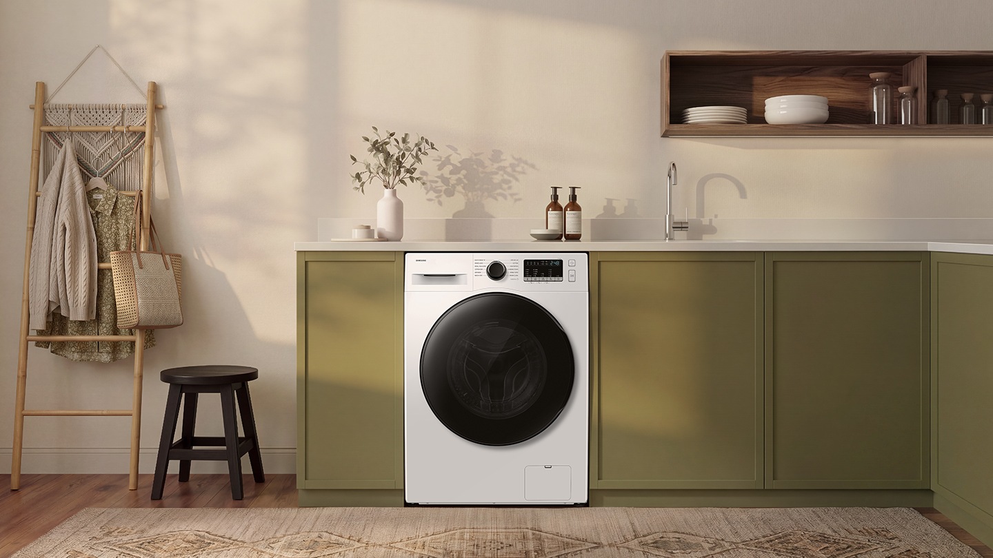 The washer is installed in a modern laundry room.