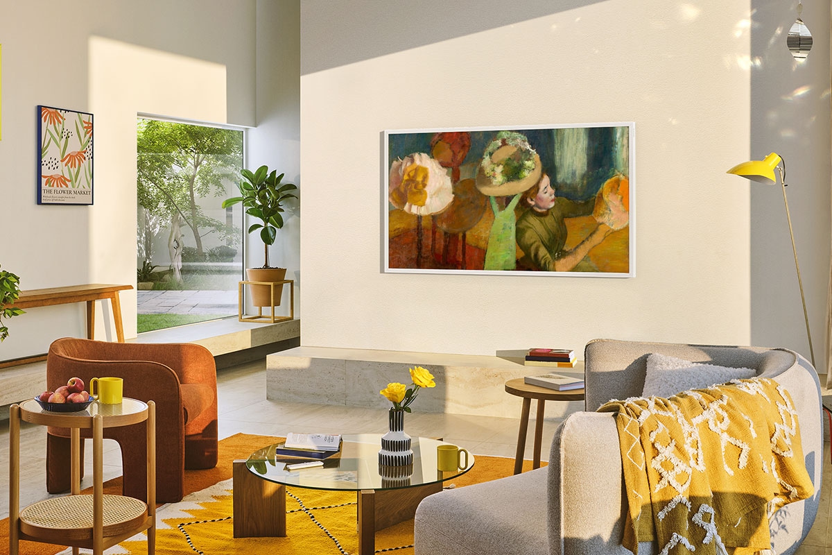 The Frame is mounted to a wall in a living room.