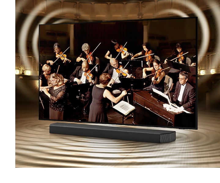 Circondati del suono armonioso della tua TV e dell'altoparlante della soundbar.  Q-Symphony consente agli altoparlanti della TV e della soundbar di lavorare insieme per un migliore effetto audio surround senza dover disattivare gli altoparlanti sul TV.