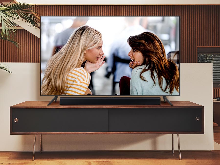 The sound from the Soundbar's side speakers emphasize dialogue when Voice Enhance is activated.