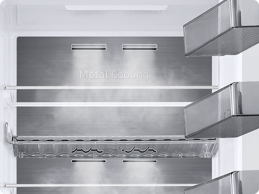 The Metal Cooling plates inside the refrigerator look extremely cold and the cold air flows around.