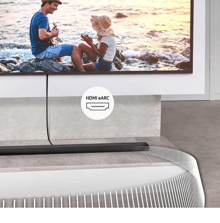 Ultra Slim Soundbar je povezan s televizorjem prek kabla. Spremna oznaka označuje HDMI eARC.