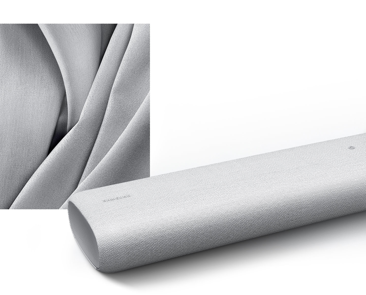 Closeup image of gray fabric material illustrates premium fabric design of S61A soundbar which is shown in front with Samsung logo visible.