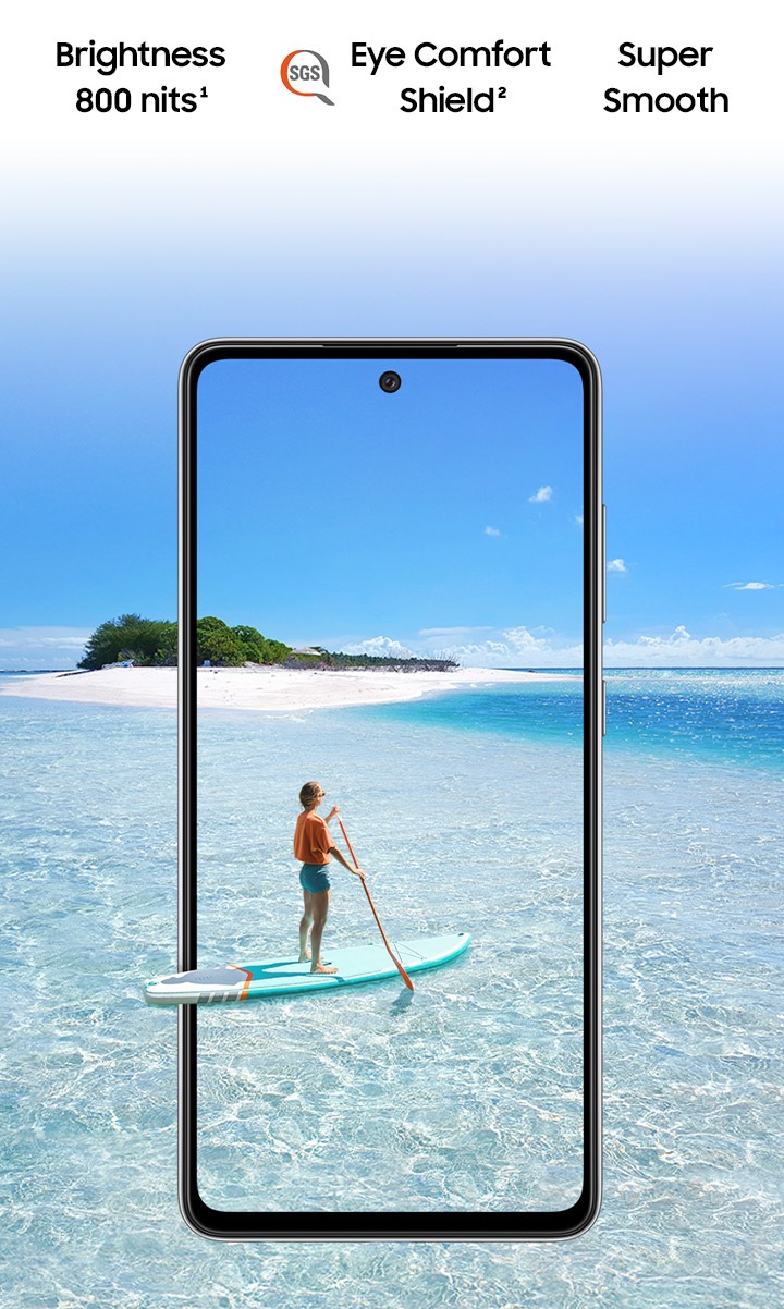 Galaxy A52s 5G seen from the front. Behind the phone and inside the display is a scene of a body of water and a small island. On the phone's screen is a person paddleboarding, and their paddleboard extends slightly outside the boundaries of the phone to represent the screen's immersive view. Text says Super Smooth, Brightness 800 nits and Eye Comfort Shield, with the SGS logo.