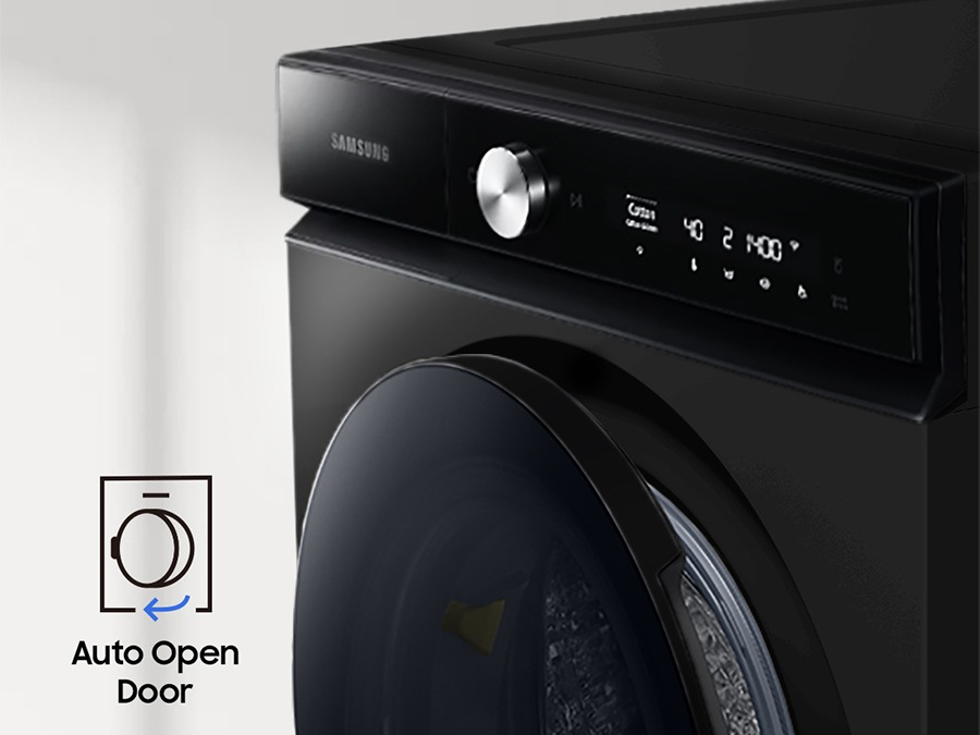A black Bespoke Grande AI dryer is placed diagonally with the text AI Dryer on its display. On the bottom left, there is a dryer icon and the text End of Course. As the text on display changes to Auto Open Door, the door opens slightly and steam comes out.