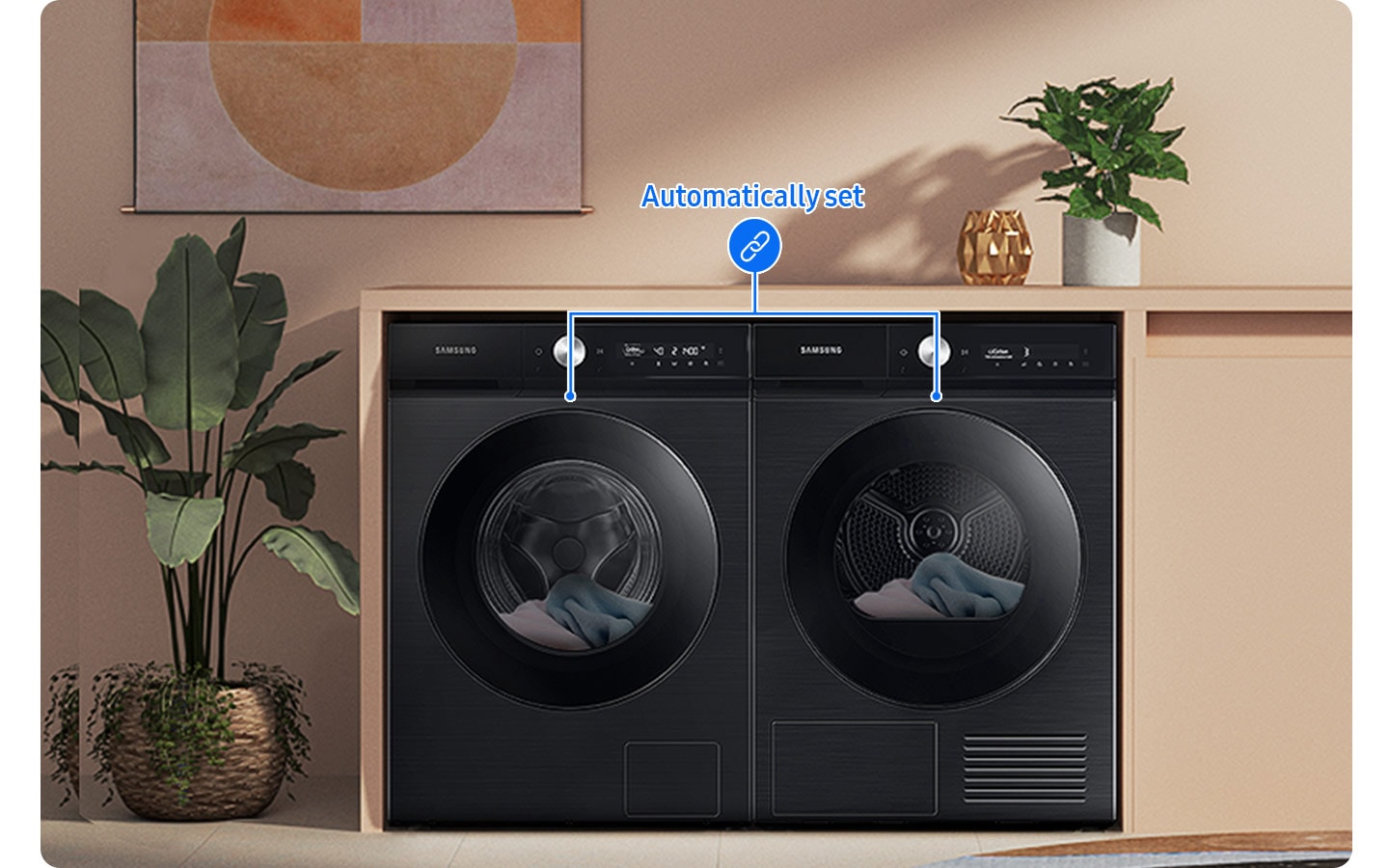 A white Bespoke Grande AI washer and dryer set is stacked vertically in a cabinet that has a wooden door with shutters. A woman is touching the knob on the washer, demonstrating the machine’s All-in-one Control function. There is a closeup of the knob, with a display located to its right. The washer has been selected and the text AI Wash and the number 40 is on the display.