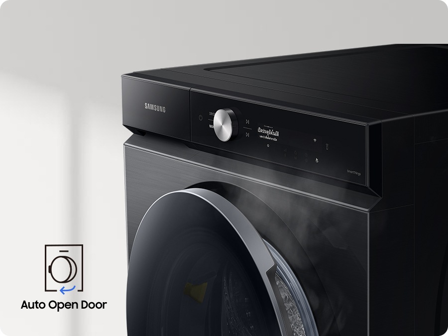 A white Bespoke Grande AI washer is placed diagonally with the text AI Wash on its display. On the bottom left, there is a washer icon the text End of Course. As the text on display changes to Auto Open Door, the door opens slightly and steam comes out.