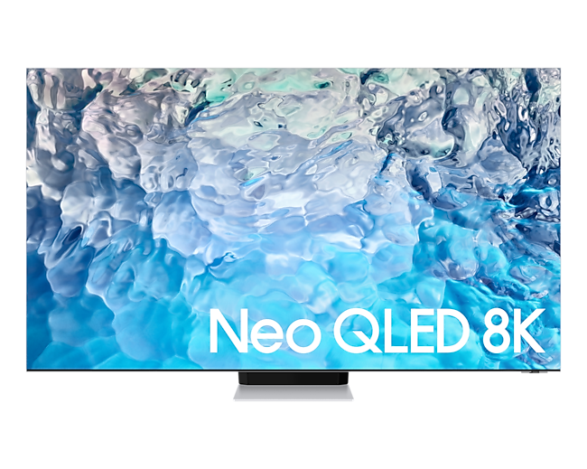 ดูราคาทีวี 65 นิ้ว ทีวี Samsung 8K Neo QLED ชัด สมจริง คมชัดระดับ 8K เต็มอิ่มกับมุมมองไร้ขีดจำกัด และเสียงรอบทิศทางเหมือนอยู่ในเหตุการณ์. ด้านหน้าของ Neo QLED 8K QN900B สี Black โชว์หน้าจอพร้อมตัวหนังสือ Neo QLED 8K สีขาว