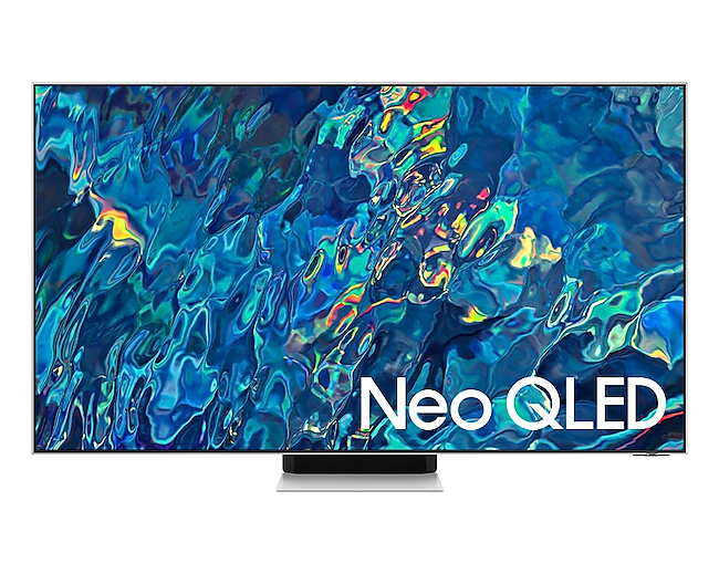 ดูราคาทีวี 65 นิ้ว ทีวี 4K Samsung Neo QLED (2022) ที่ให้ภาพคมชัด ดำสนิท สมจริง ชัดเจนครบทุกรายละเอียดในระดับ 4K พร้อมให้เสียงสมจริง. หน้าจอ QN95B Neo QLED 65 นิ้ว สี Silver โดยมีตัวหนังสือ Neo QLED สีขาวระบุอยู่ด้านล่างของจอ