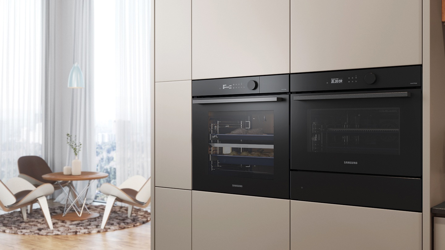 Shows the built-in oven installed in a kitchen, with two cooking zones and a hinged door, next to a Microwave Combi oven.