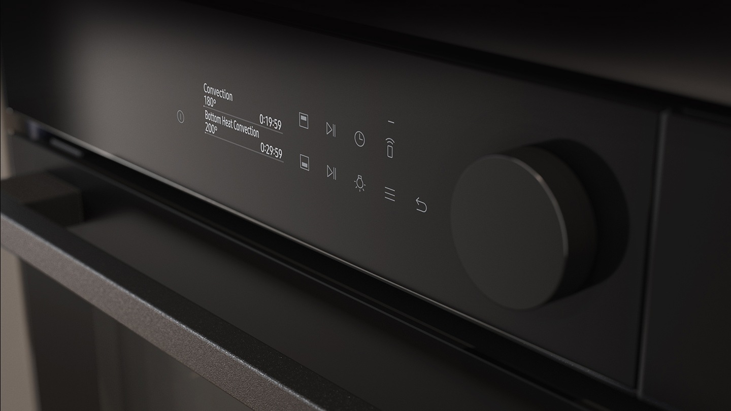 Shows a close-up of the oven's stylishly minimalist control panel with an LCD display, which shows pictures of the various cooking options, touch control and a single knob.