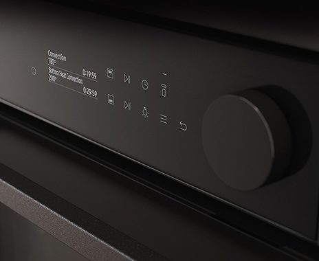 Shows a close-up of the oven's stylishly minimalist control panel with an LCD display, touch control and a single knob.