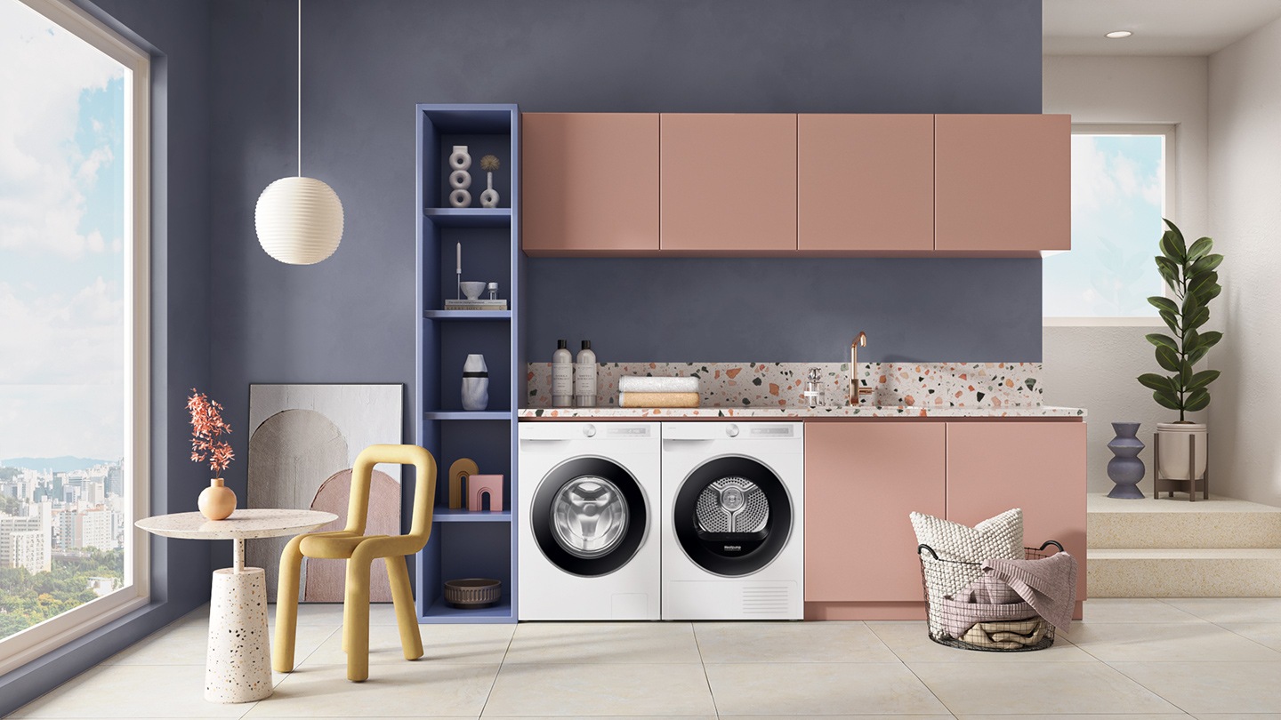 WW6000D, kurutma makinesi ile birlikte çamaşır odasına yerleştirilmiş.