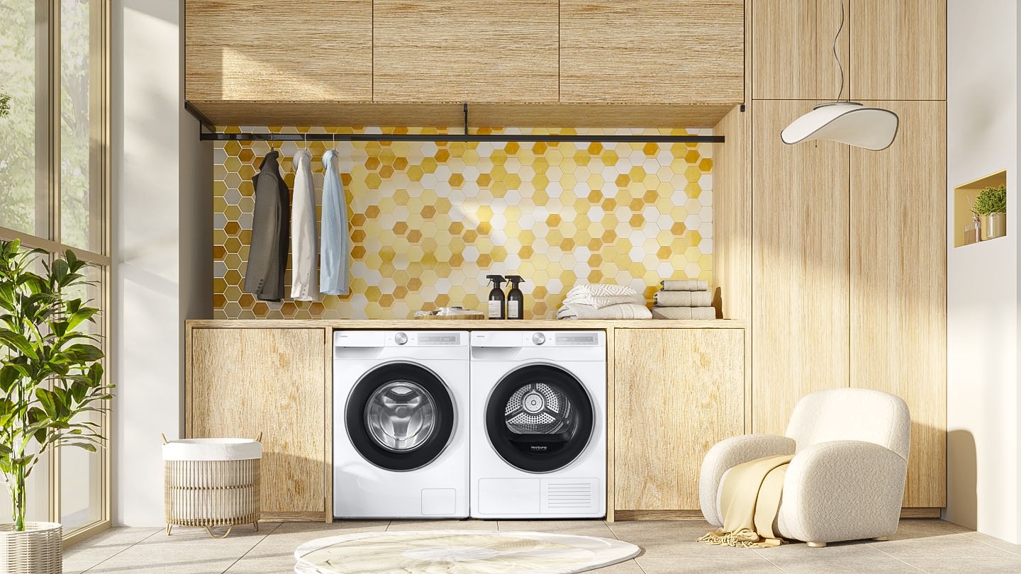 The dryer is installed with washer in the modern laundry room.