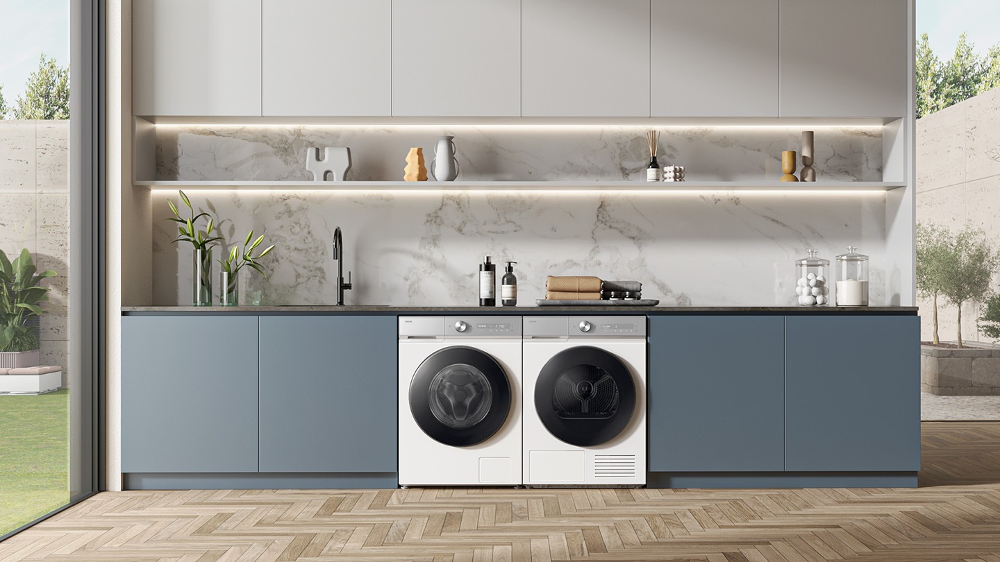 The dryer is installed with washer in the modern laundry room.